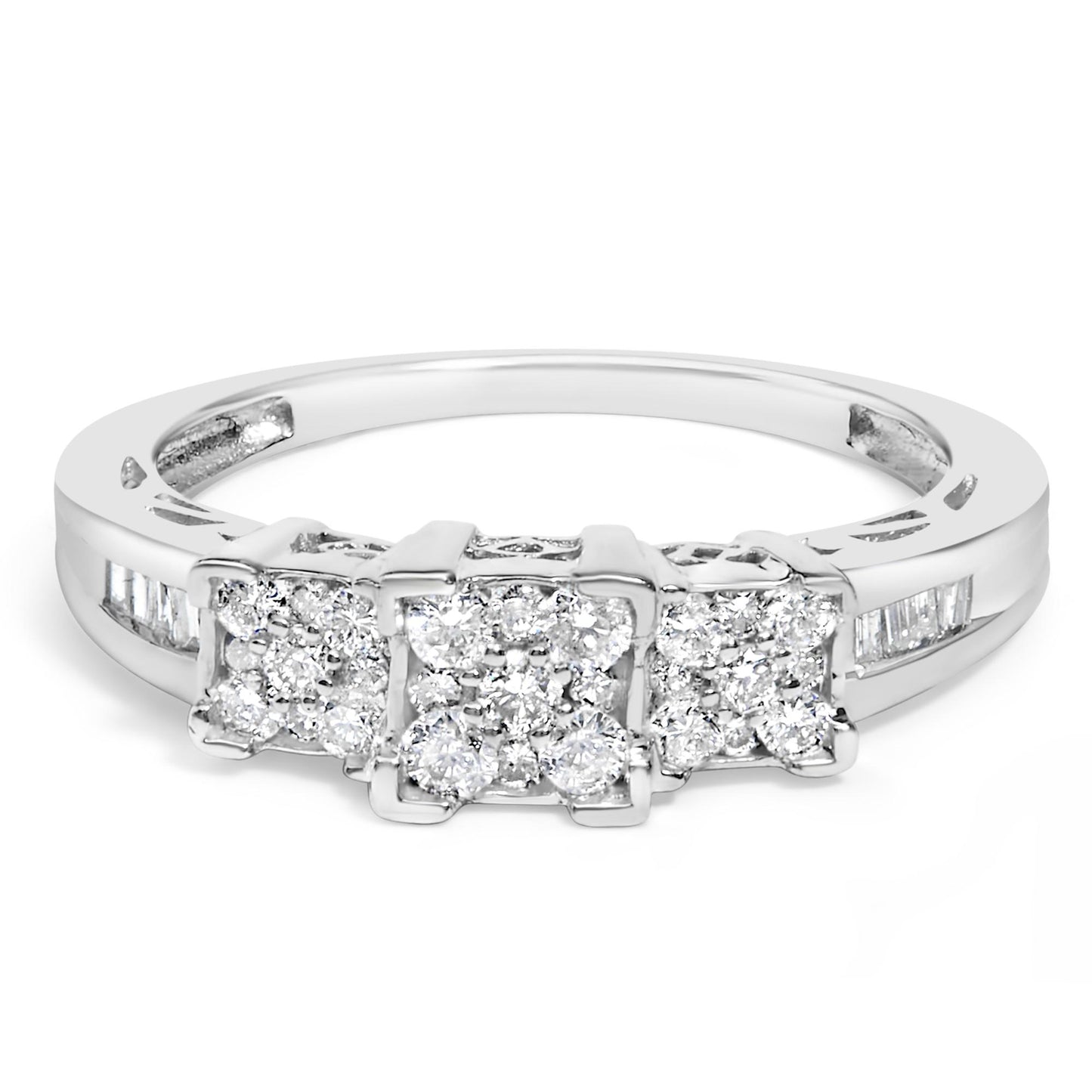 Close-up front angle of a white metal ring with three square clusters of round pave-set white gemstones and baguette-shaped gemstones channel-set along the band.