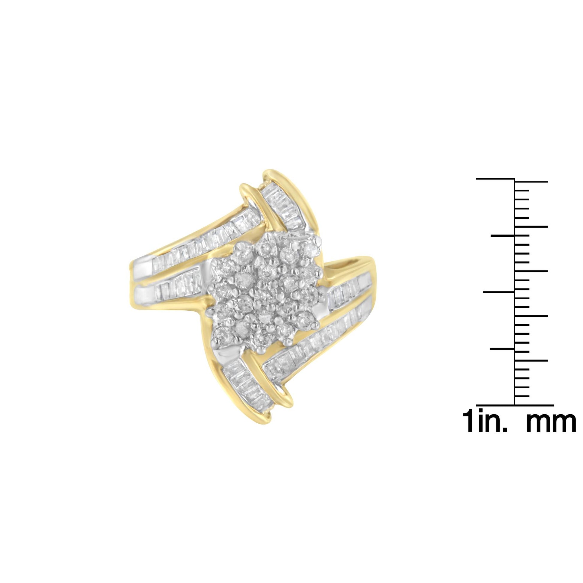 Yellow metal ring with cluster of round white gemstones in prong setting at center, accented by baguette white gemstones in channel setting on band, shown at angled top view, placed next to ruler for size reference.