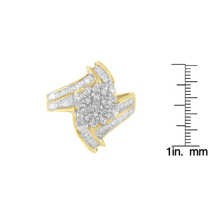 Yellow metal ring with cluster of round white gemstones in prong setting at center, accented by baguette white gemstones in channel setting on band, shown at angled top view, placed next to ruler for size reference.