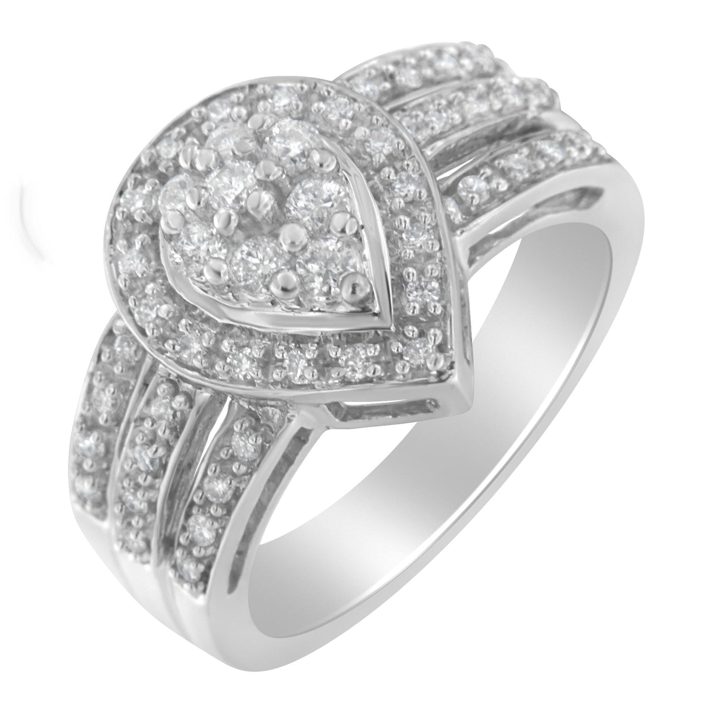 Angled close-up of a white ring featuring a heart-shaped cluster of round white gemstones in a pave setting on top, with additional pave-set round white gemstones adorning the band.