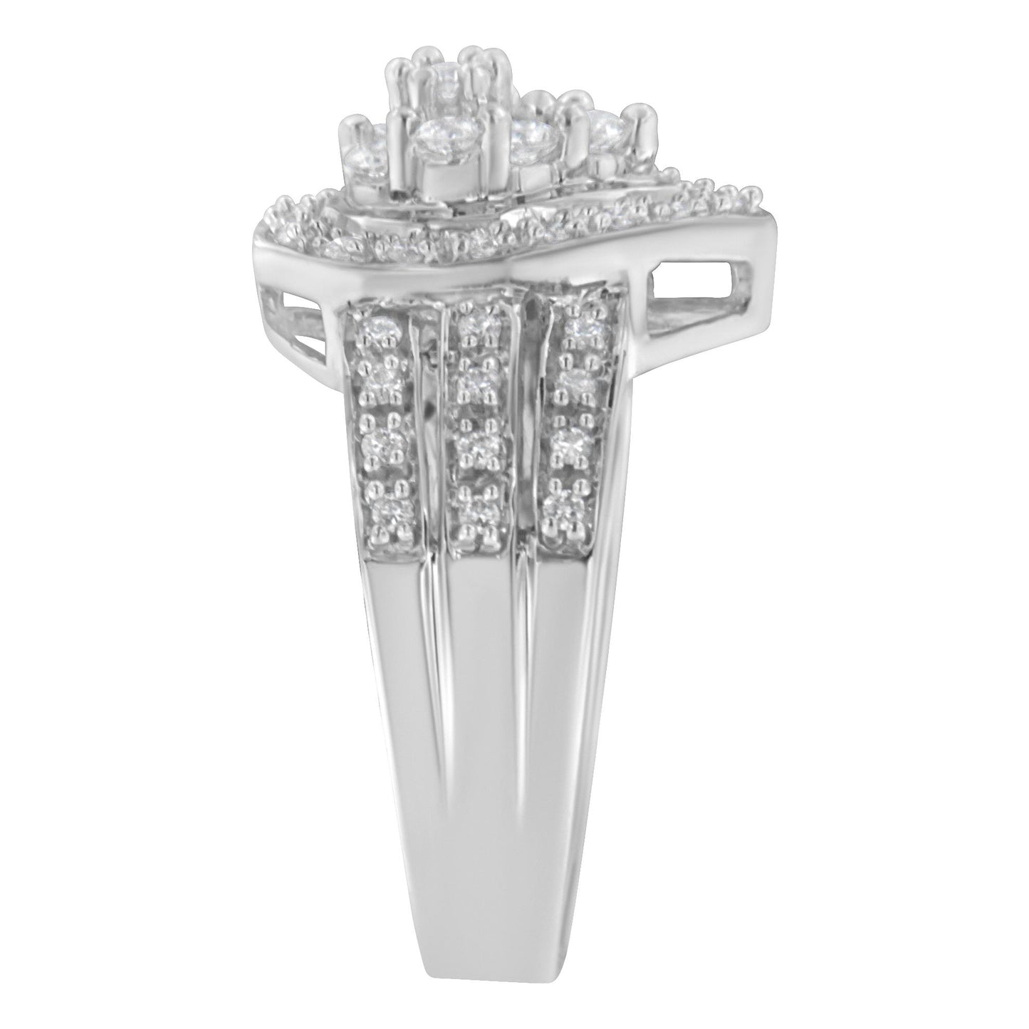 Front angled view of a white metal ring featuring multiple round white gemstones in a pave setting arranged in a layered design on the top and along the split band.