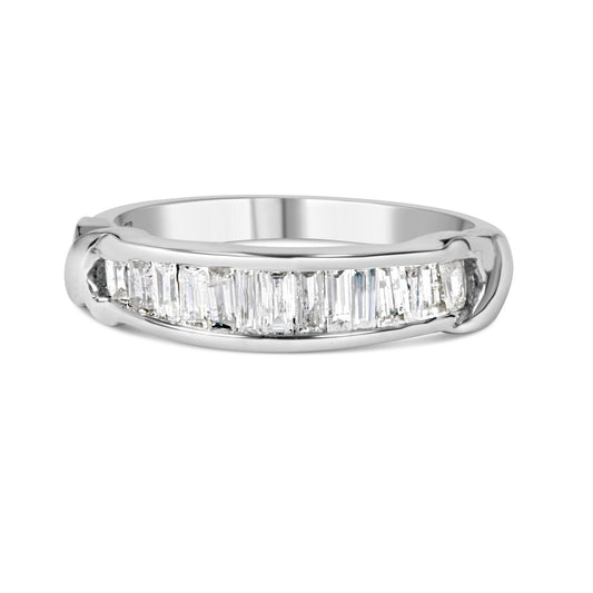 Front angle of a white metal ring featuring a channel setting with aligned baguette-shaped white gemstones.