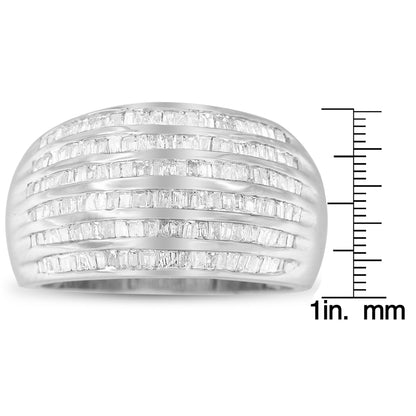 Front angle view of a white ring with multiple rows of channel-set baguette-shaped white gemstones, displayed next to a ruler for size reference.