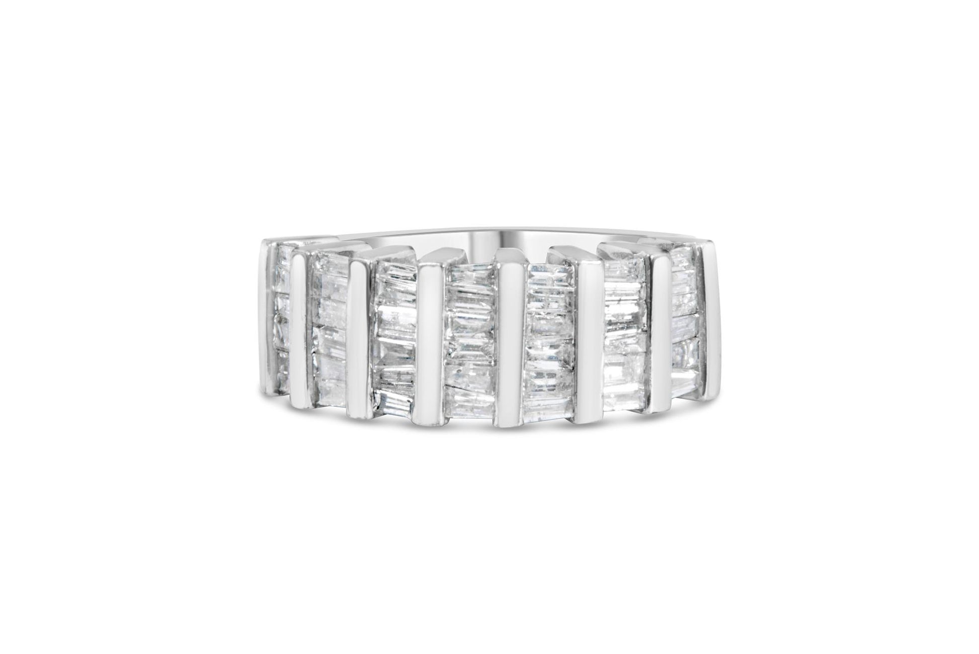White metal ring with channel-set baguette-shaped white gemstones, front angled view on a white background.