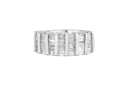 White metal ring with channel-set baguette-shaped white gemstones, front angled view on a white background.
