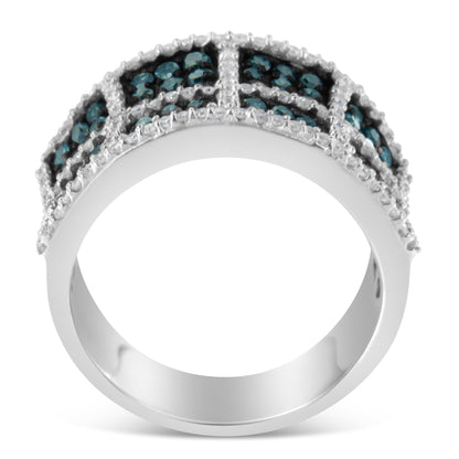 Close-up front view of a white metal ring featuring two rows of round blue gemstones and a row of round white gemstones set in prongs within a grid-like pattern.