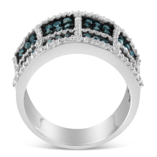 Close-up front view of a white metal ring featuring two rows of round blue gemstones and a row of round white gemstones set in prongs within a grid-like pattern.