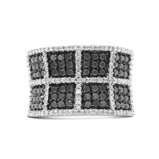 Front view of a wide white metal ring featuring a grid pattern of prong-set white gemstones and pave-set black gemstones.