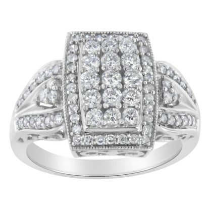 White metal ring with rectangular face featuring multiple round white gemstones in pave setting, shown from front angle.