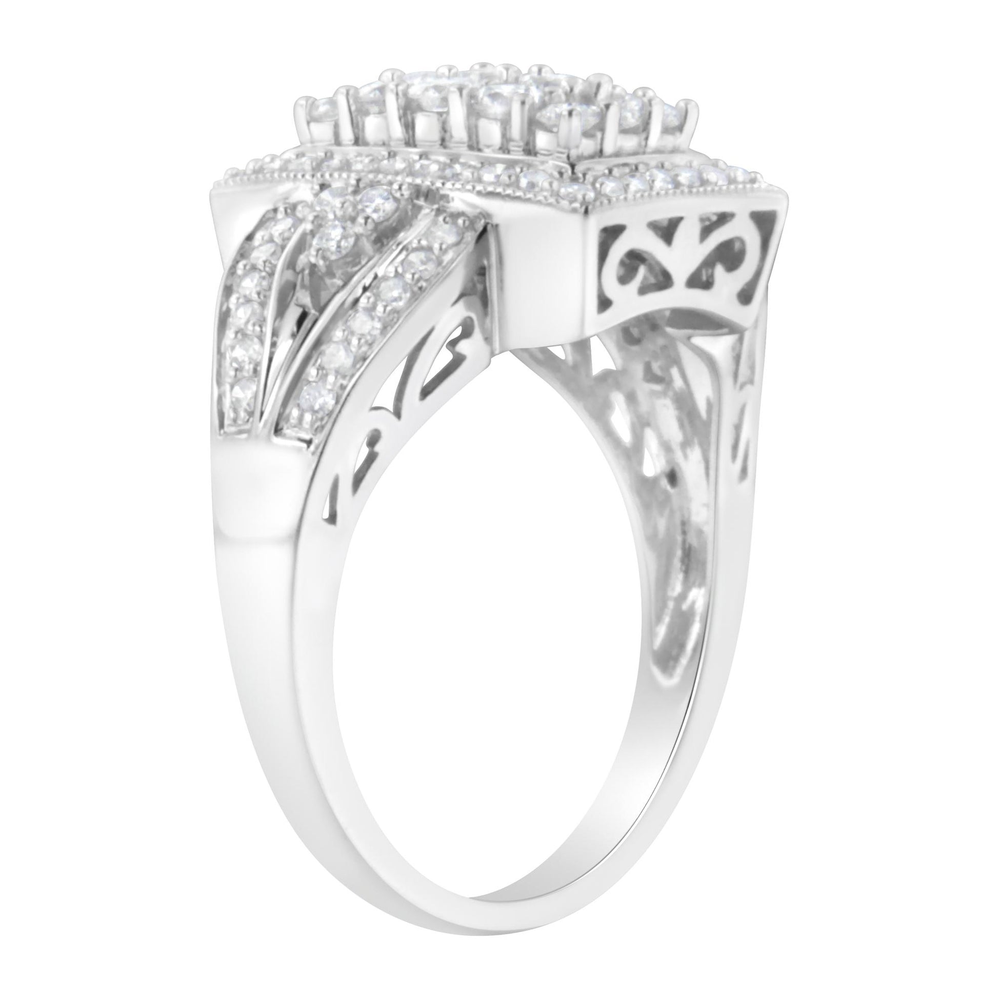 White metal ring with round white gemstones in pave setting and filigree detailing, shown from a side angle.