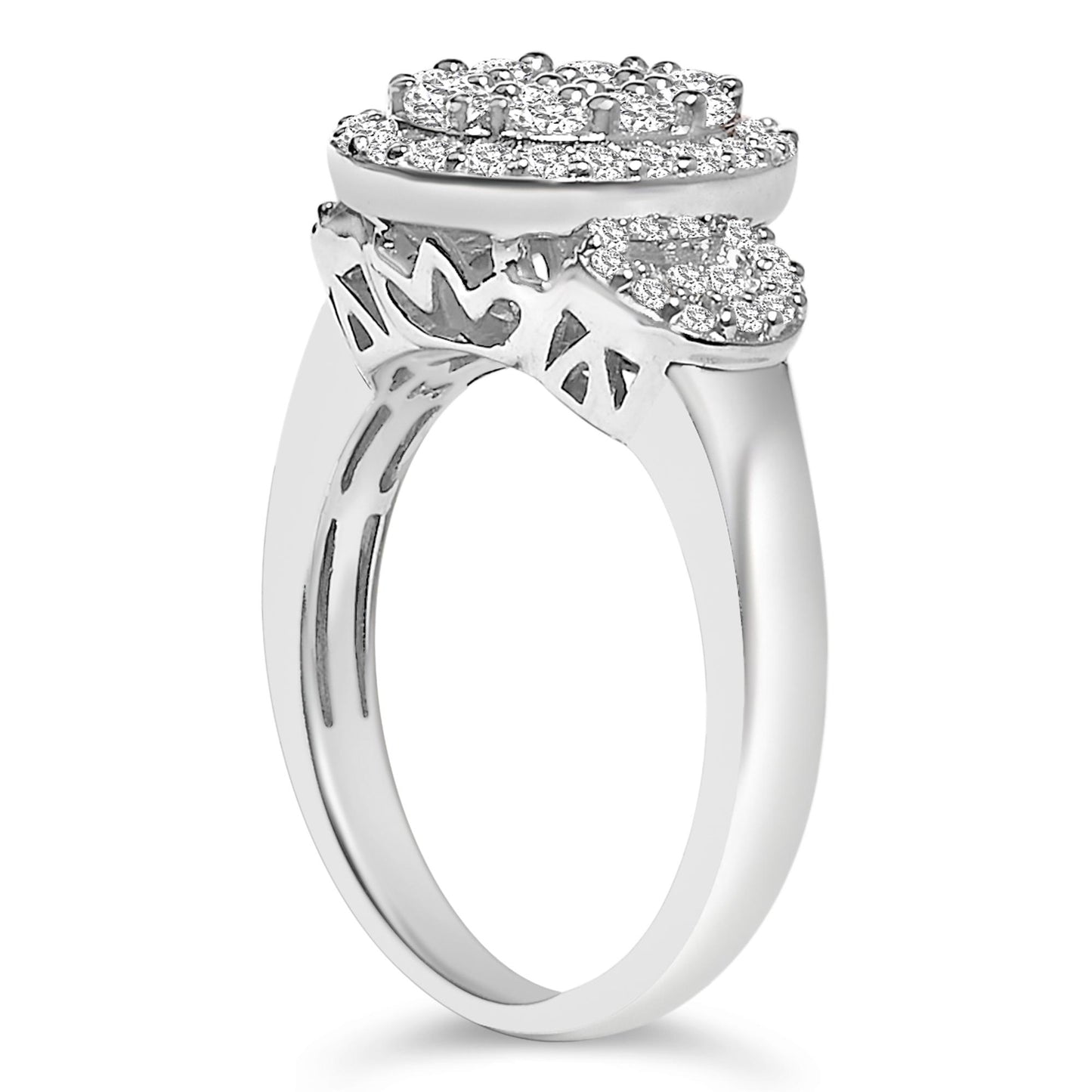 White metal ring with multiple round and baguette shaped white gemstones in prong and channel settings, side angle view.
