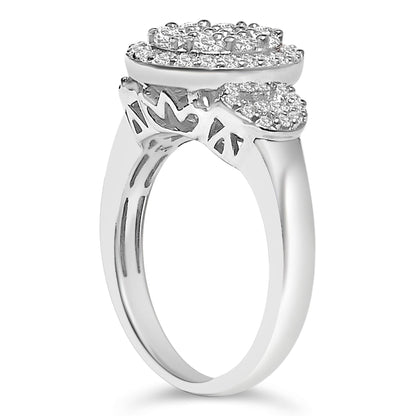 White metal ring with multiple round and baguette shaped white gemstones in prong and channel settings, side angle view.