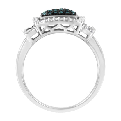 White metal ring shown from side angle, featuring clusters of round blue and white pave-set gemstones on the top.