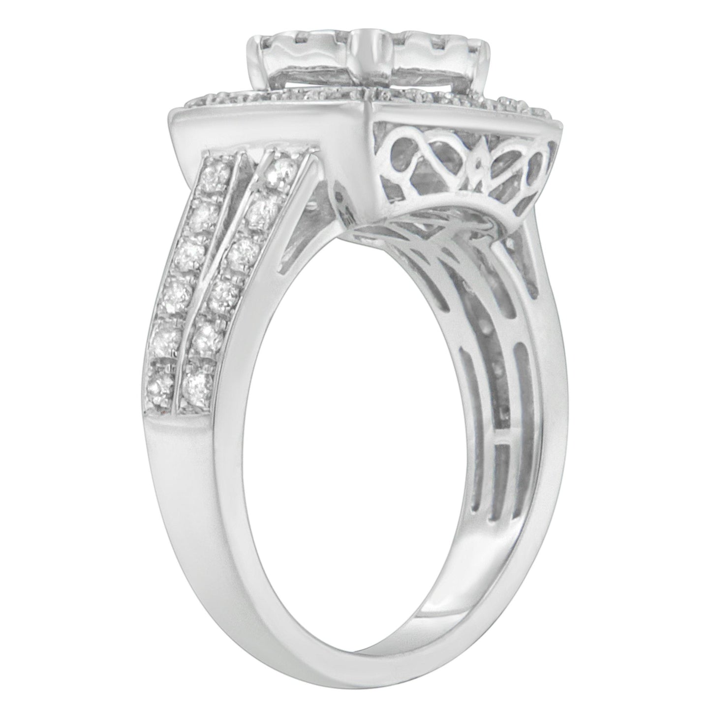 Side angle view of a white ring with round white gemstones in pave setting along the band and intricate cut-out design under the setting.