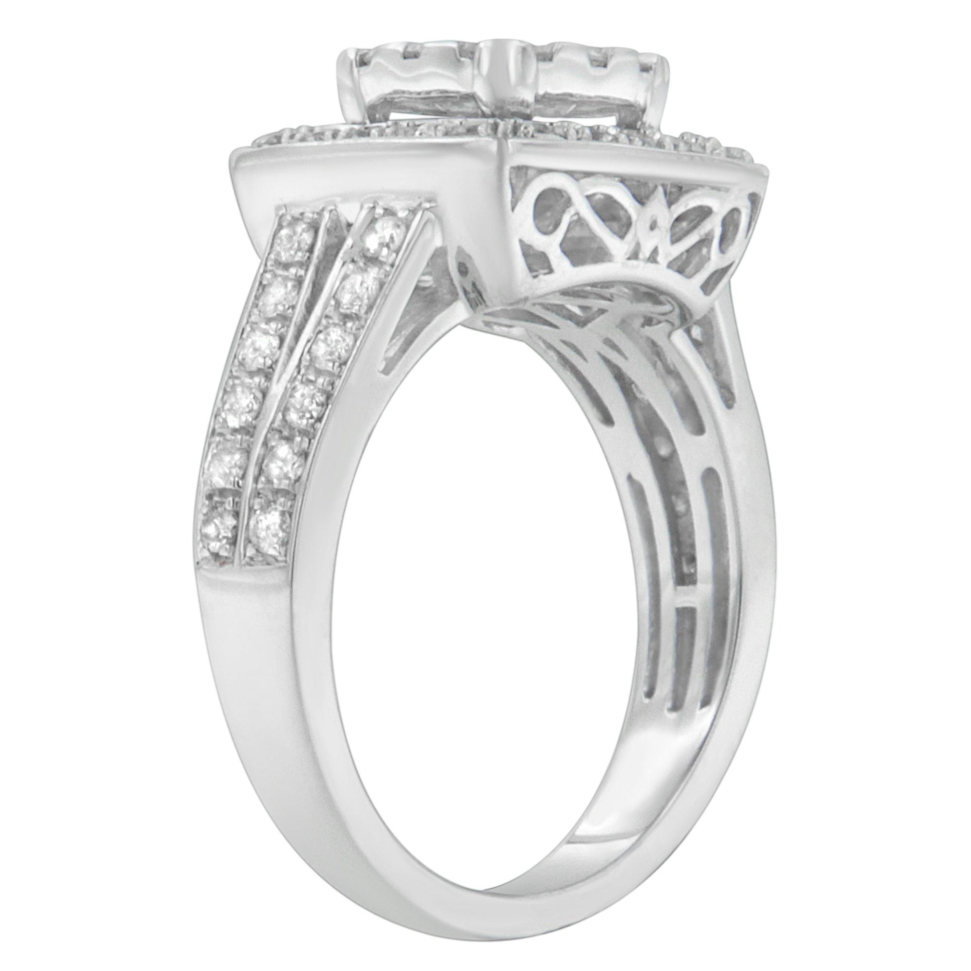 Side angle view of a white ring with round white gemstones in pave setting along the band and intricate cut-out design under the setting.