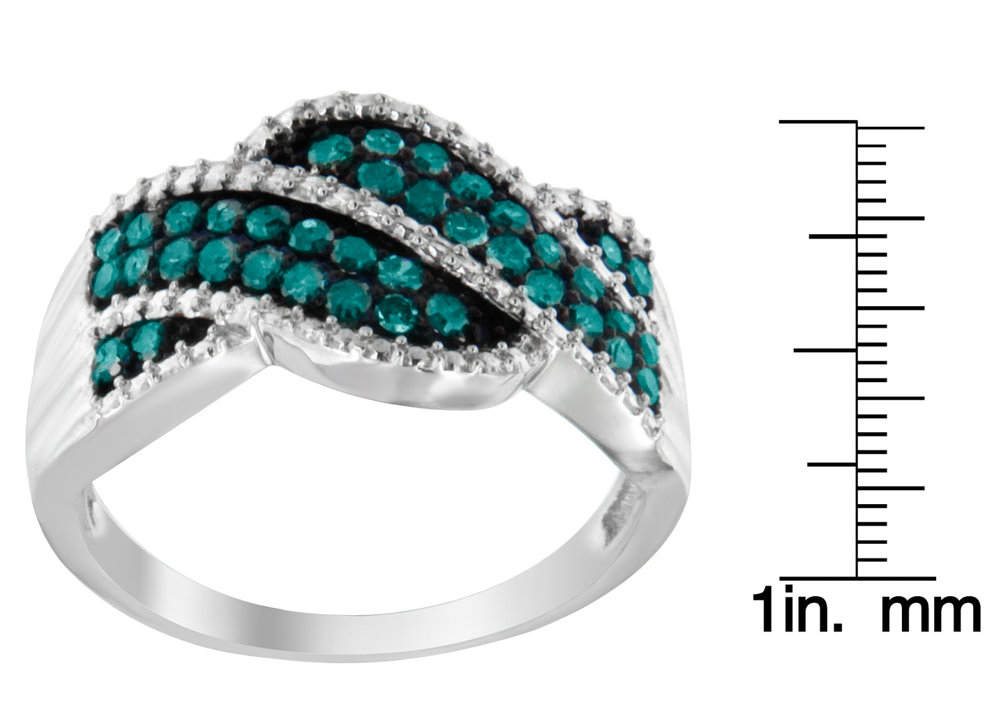 White metal ring with multiple rows of round blue gemstones in a prong setting, photographed at an angled top-front view, shown next to a ruler for size reference.