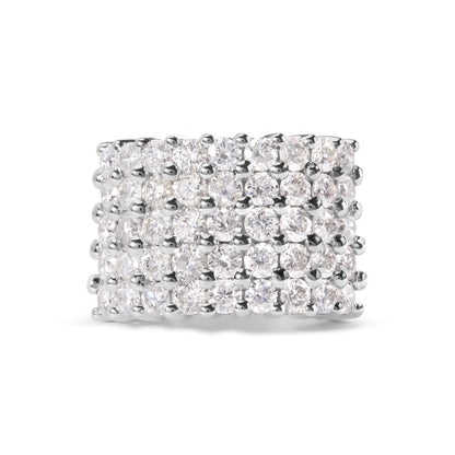 Close-up front view of a wide white metal ring featuring multiple rows of round white gemstones in a prong setting.