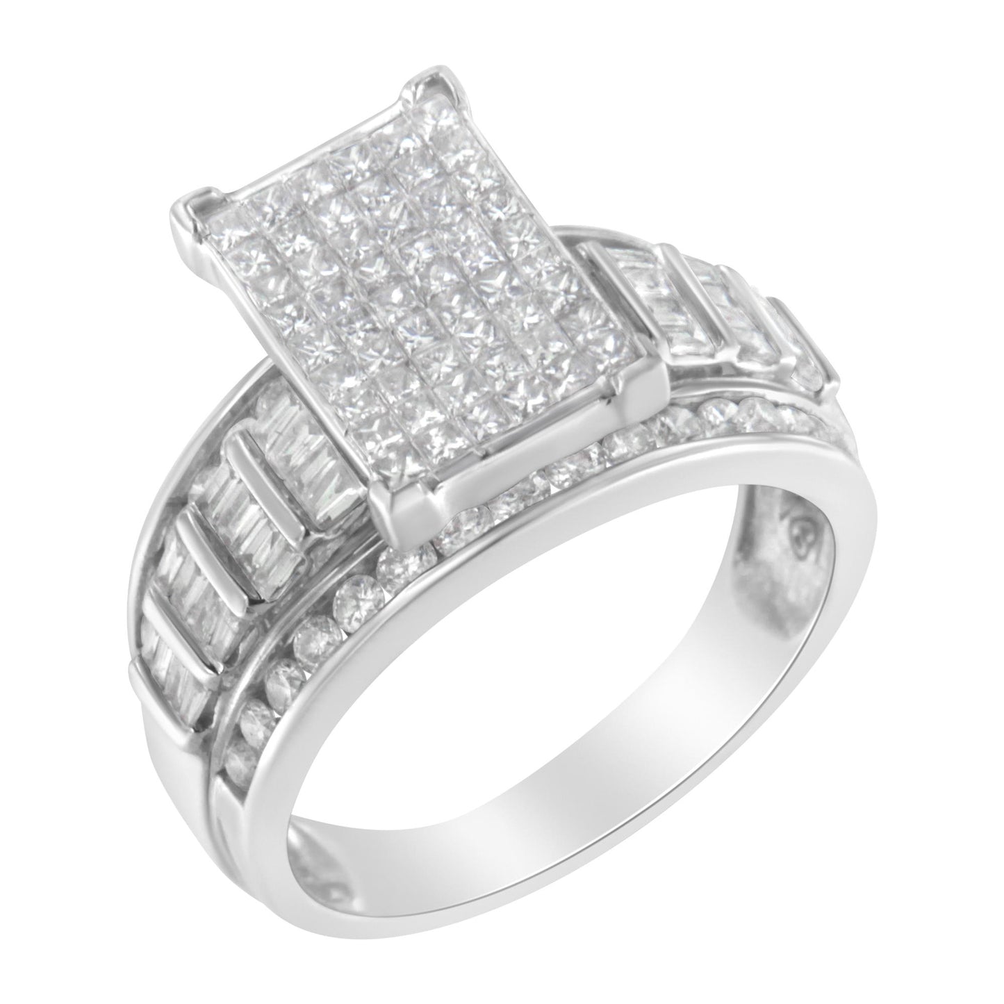 Close-up angled view of a white metal ring featuring a rectangular cluster of princess cut white gemstones in an invisible setting on top, with rows of baguette and round white gemstones set in channels along the band.
