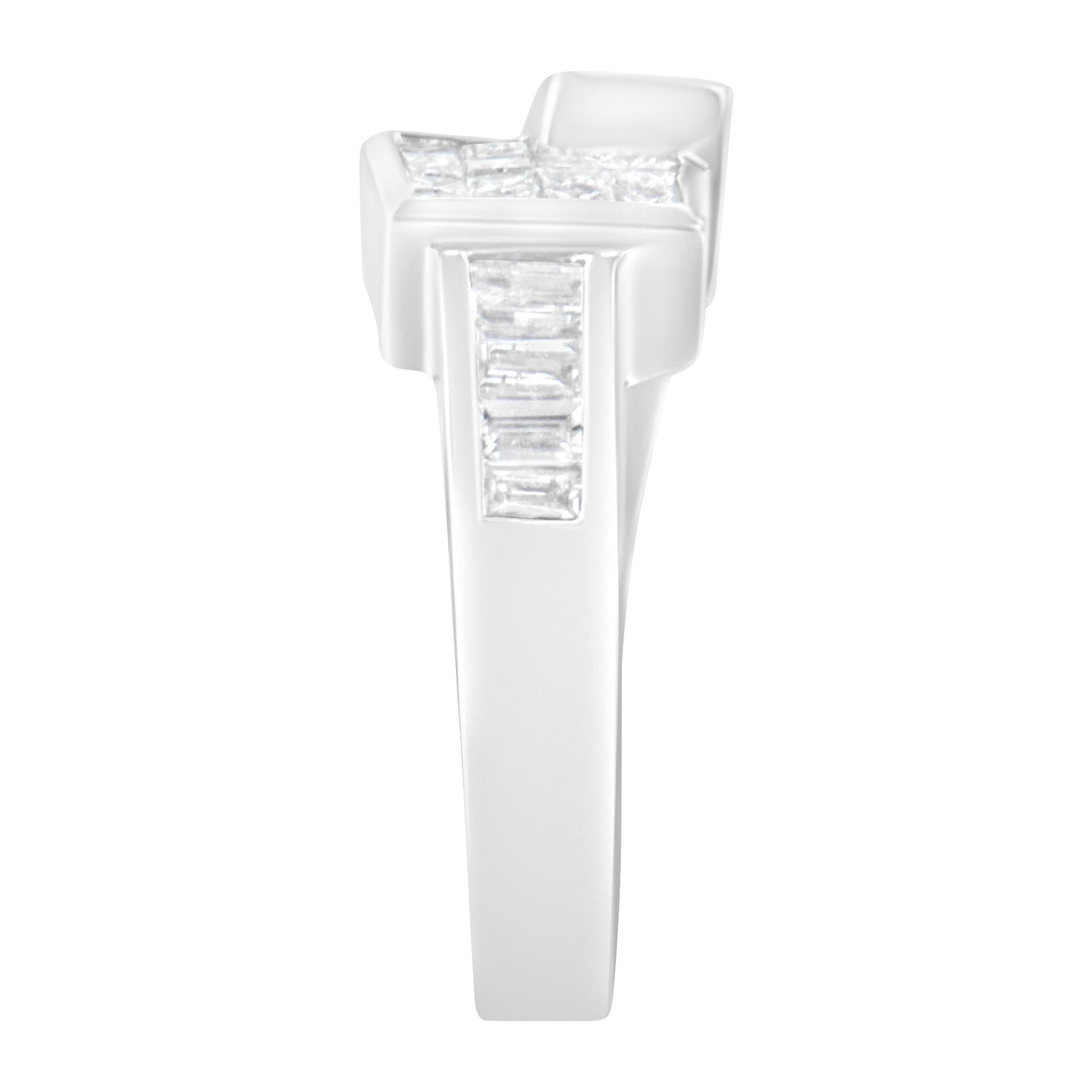 White metal ring with princess and baguette shaped white gemstones in channel settings, shown in a front close-up view.