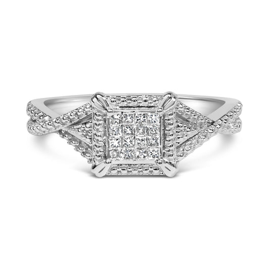 Front view of a white metal ring with a square cluster of princess-shaped white gemstones set invisibly, featuring a textured band design.
