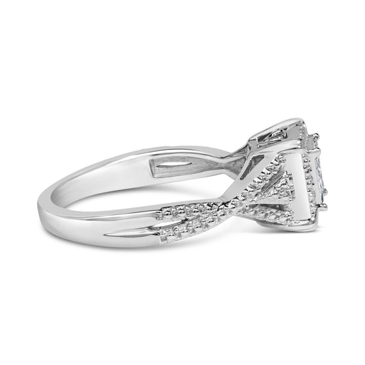 Side angle view of a white metal ring with princess shape white gemstones in an invisible setting.