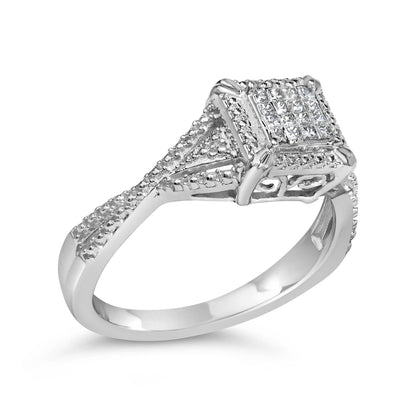 White metal ring with a square cluster of princess-shaped white gemstones in an invisible setting, viewed from a side angle.