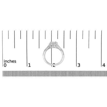 Top view of a white metal ring with princess shape white gemstones in an invisible setting, placed on a ruler for size reference.