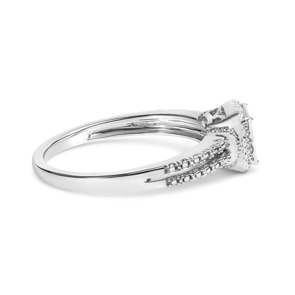 Side view of a white metal ring with white princess-shaped gemstones in an invisible setting along the band and around the center.