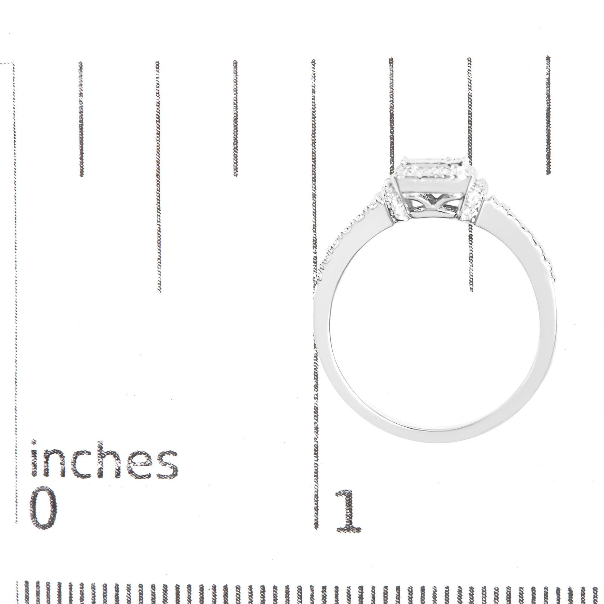 White ring with princess-shaped white gemstones in invisible setting viewed from the side, placed on a ruler for size reference.