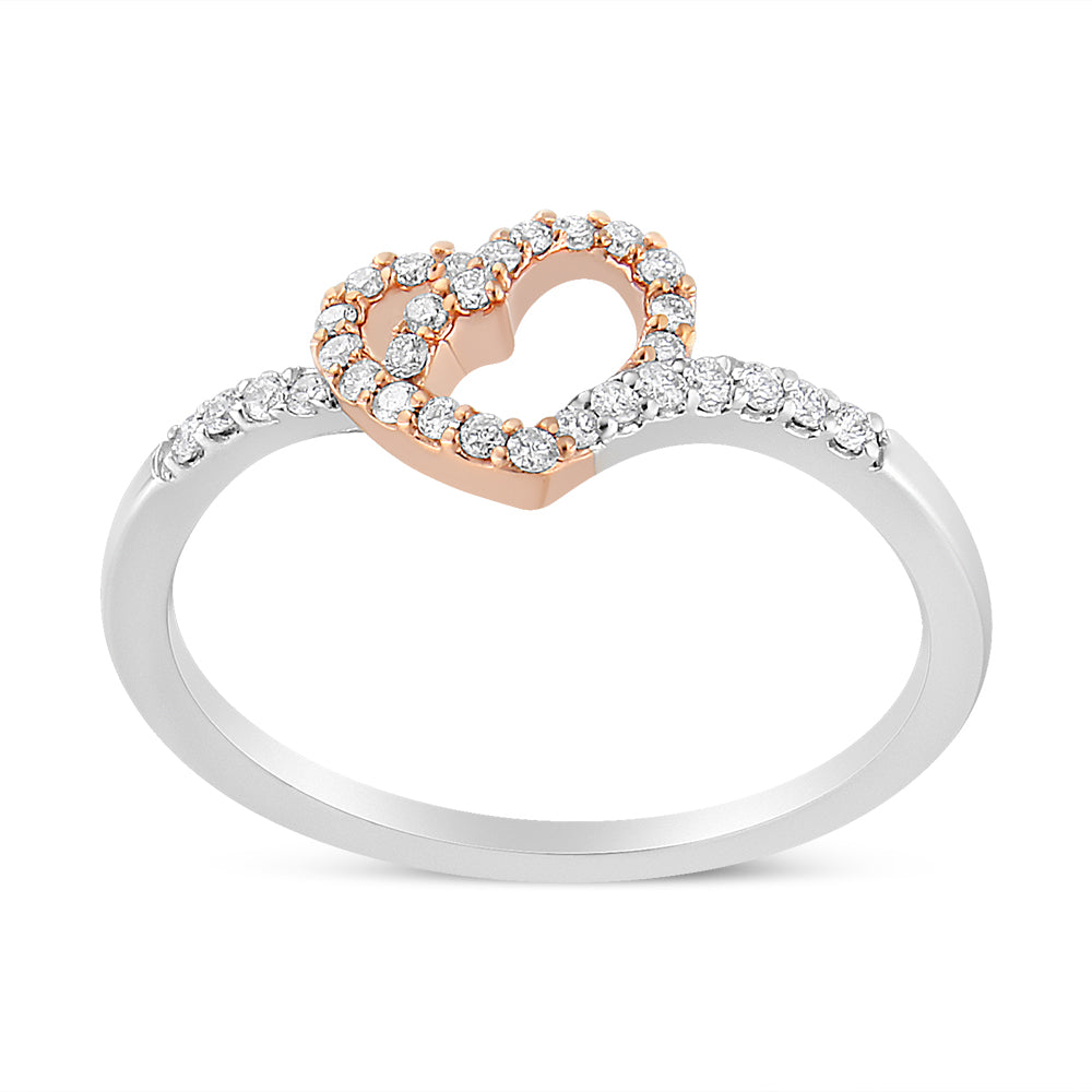 Ring with a rose metal heart outline set with round white gemstones, accompanied by a silver band partially adorned with round white gemstones, shown from a front angle.