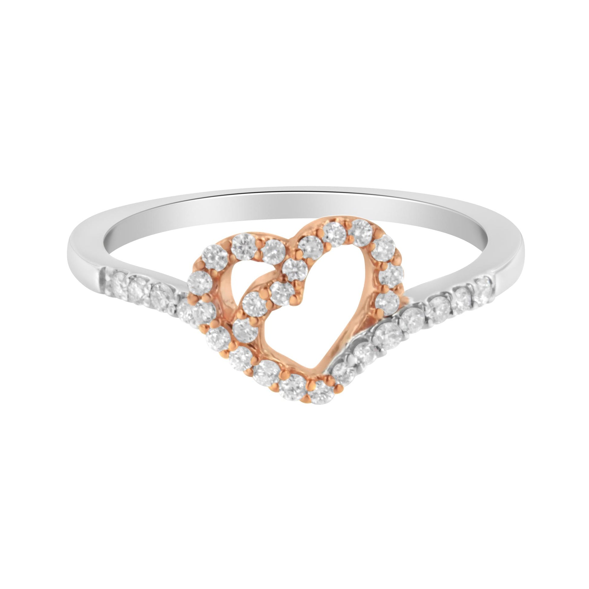 Close-up front angle of a white and rose metal ring featuring an open heart design with prong-set white round gemstones on the heart and along the white metal band.