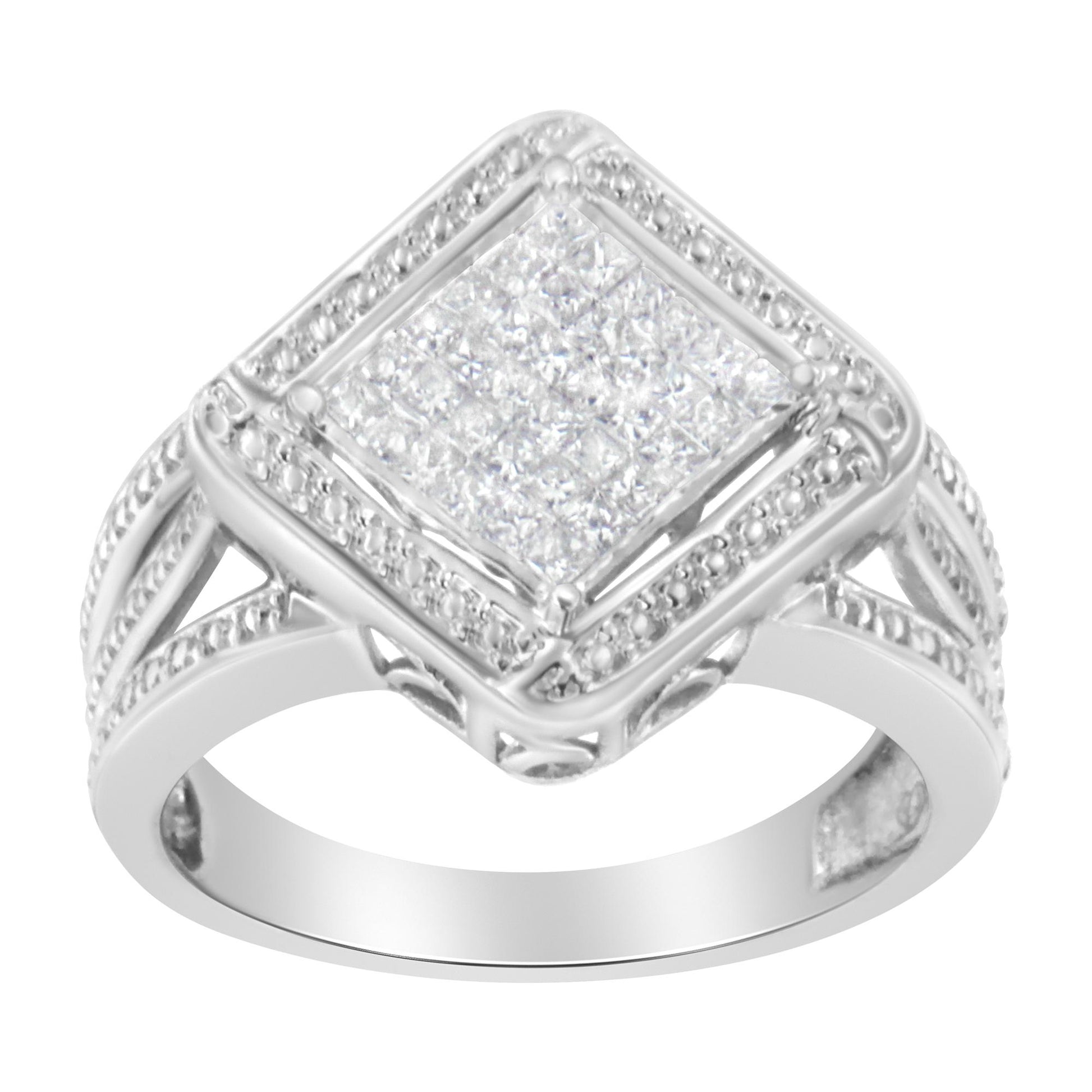 Front-facing close-up of a white metal ring featuring a large square top with multiple small white gemstones arranged in an invisible setting, surrounded by a halo of smaller white gemstones and decorative band detailing.