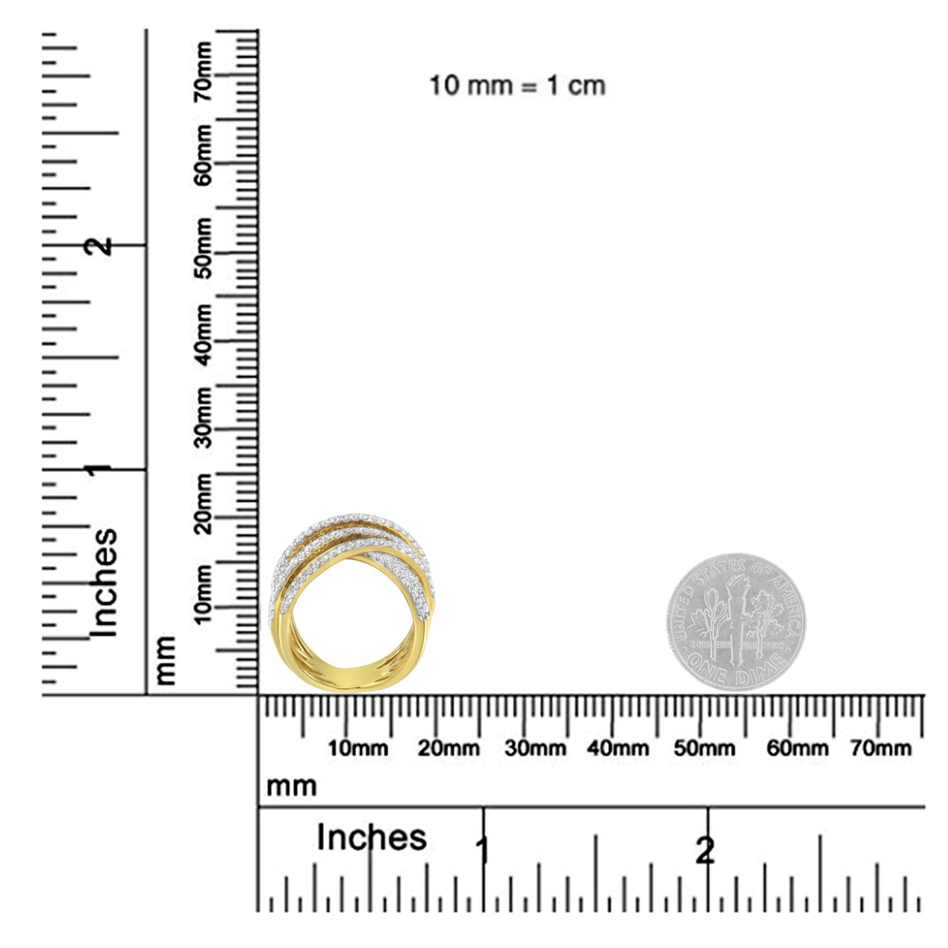 Yellow ring with three curved bands set with white round pave gemstones, shown on a ruler for size reference, front angle.