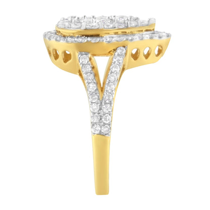 Side angle view of a yellow metal ring with round white gemstones set in prongs along the band and around the top in a layered design.