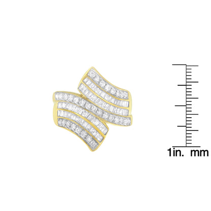 Close-up front angle shot of a yellow ring featuring curved rows of round and baguette white gemstones in pave and channel settings, shown next to a ruler for size reference.