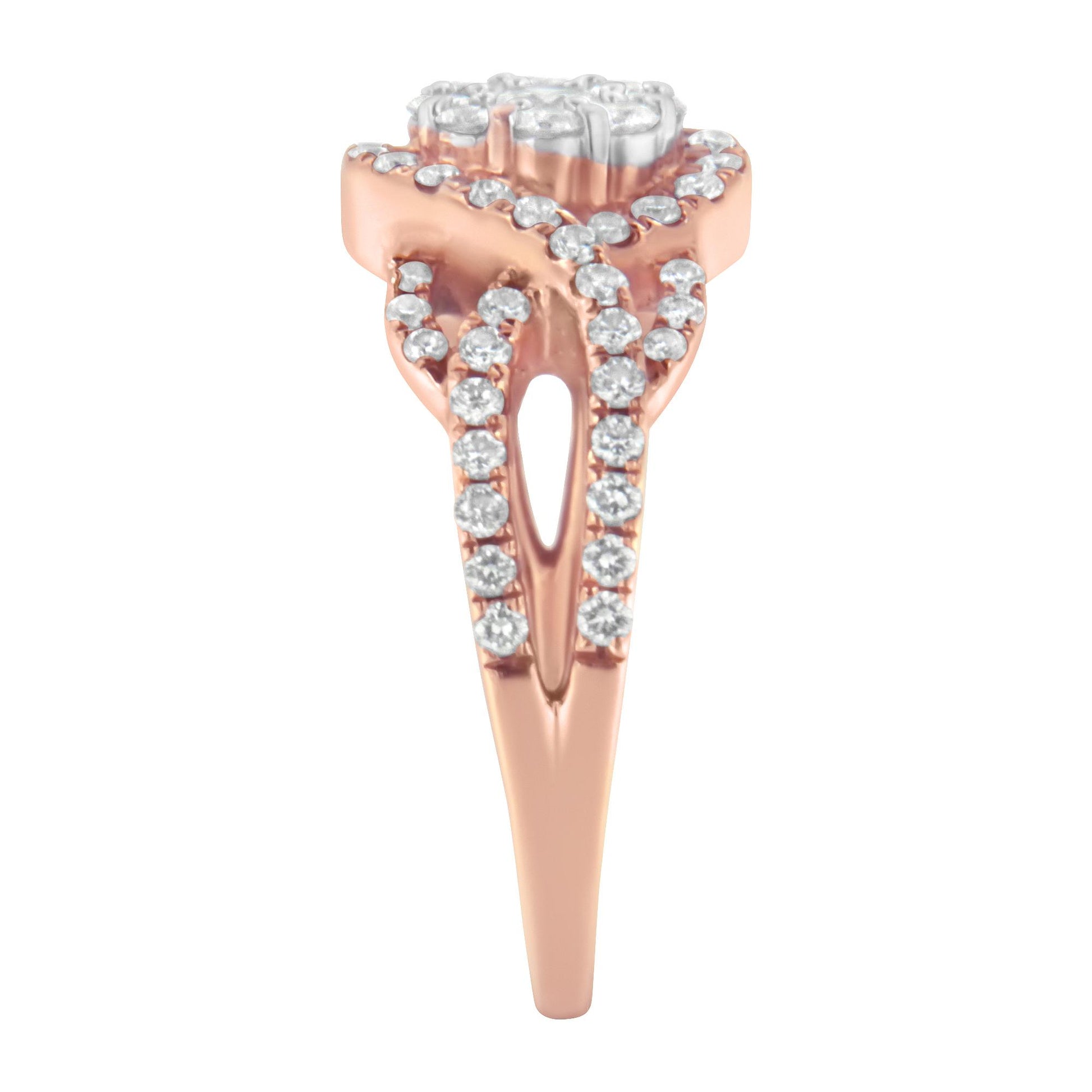 Close-up front view of a rose-colored ring featuring multiple round white gemstones in prong settings along the band and forming a cluster at the top.