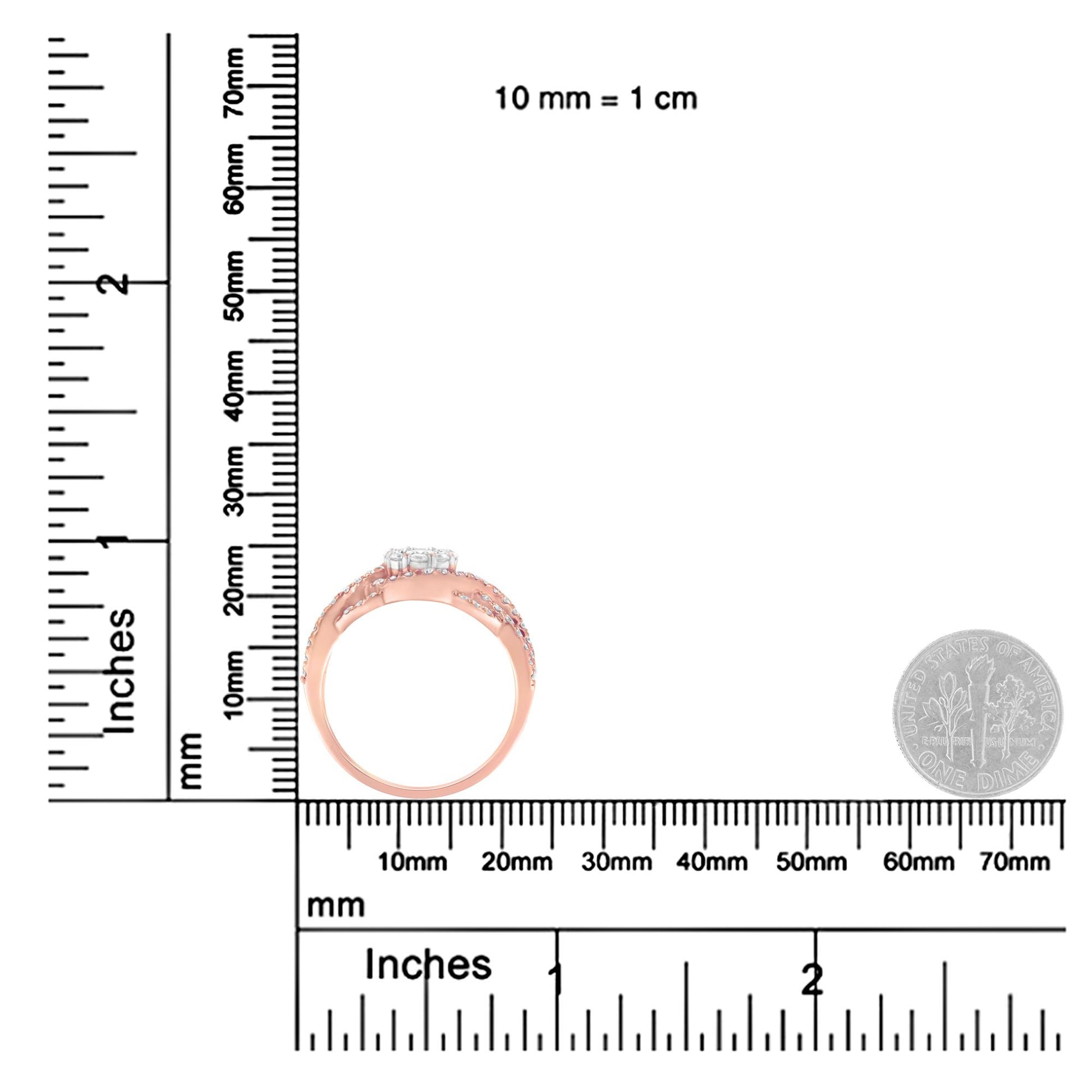 Side view of rose metal ring with multiple white gemstones in prong settings, shown on a ruler and scale with a dime for size reference.