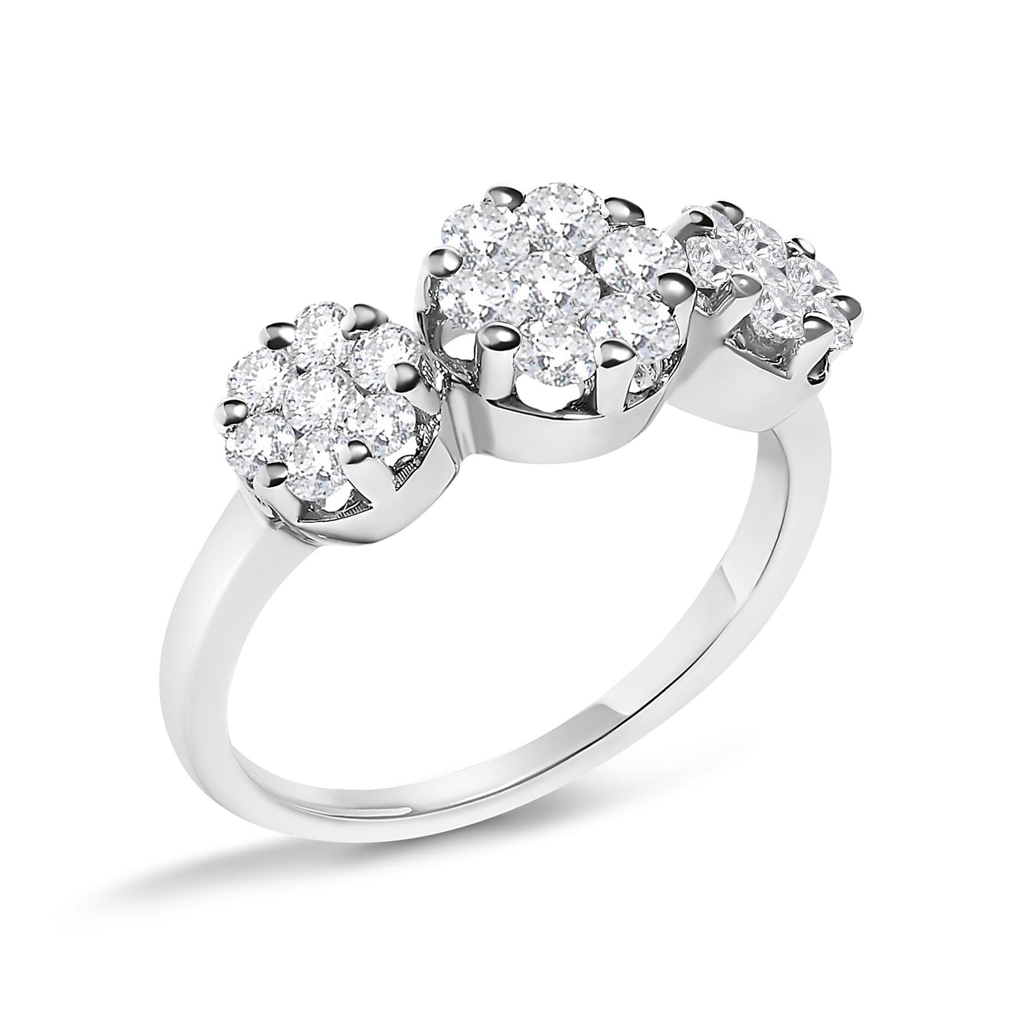 White metal ring with three clusters of round white gemstones in prong settings, shown at an angled close-up.