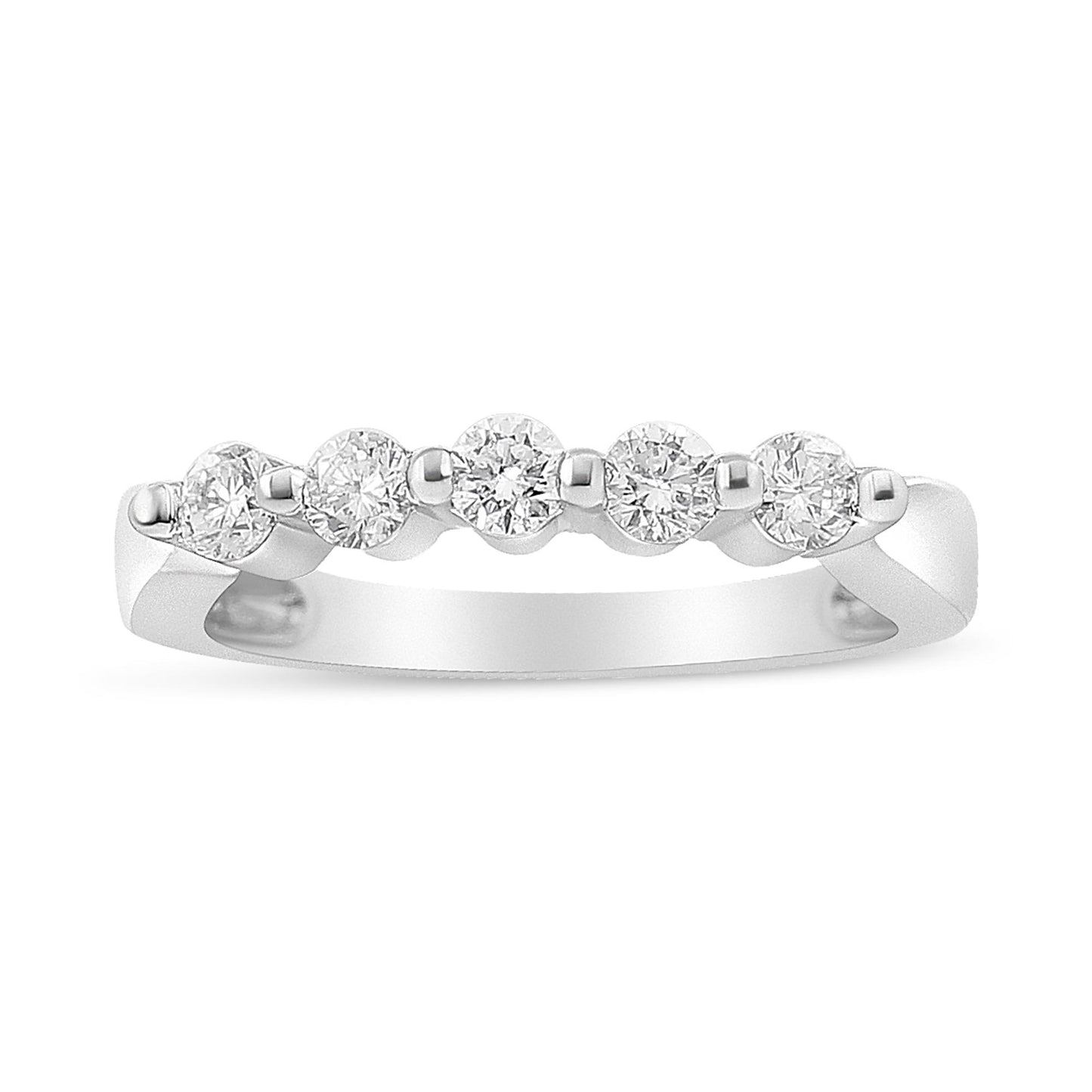 White metal ring with five round white gemstones in a pave setting, shown from a front angle.