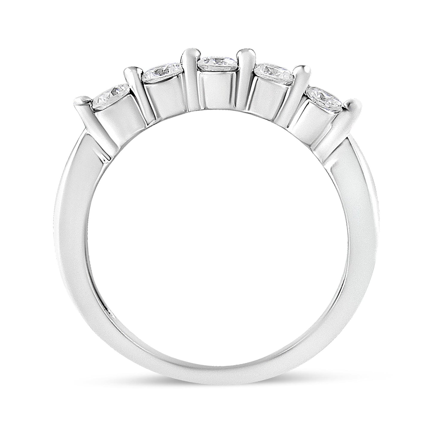 White metal ring with five round white gemstones in a pave setting, shown from a front angle.