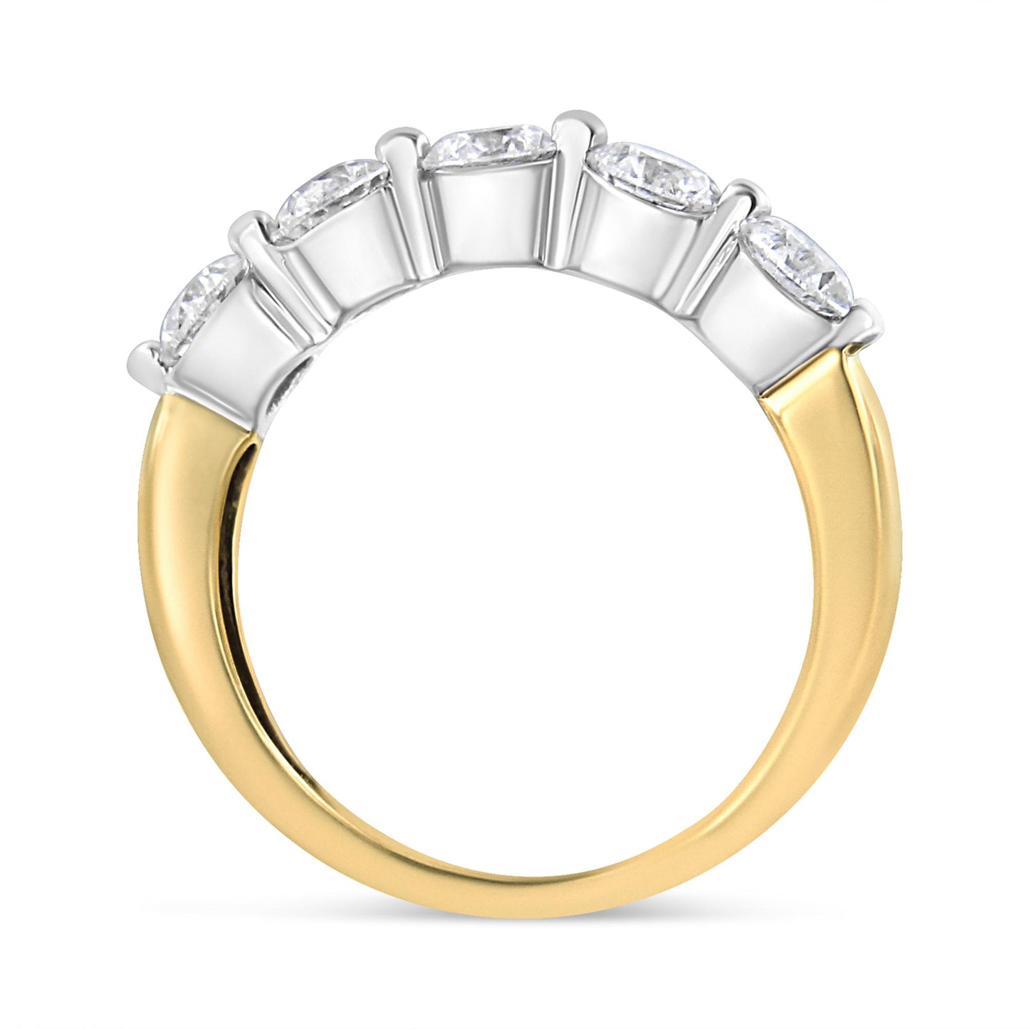 Two-toned ring viewed from the side, featuring five round white gemstones in 2-prong settings along the top.