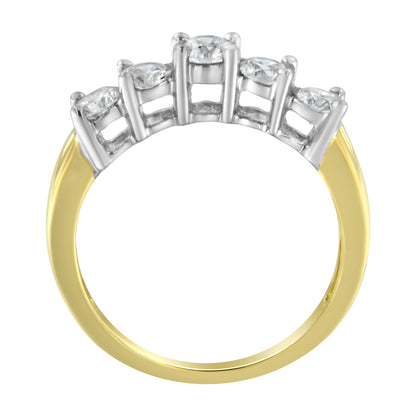 Front angle of a two-tone ring with a yellow band and white prong settings holding five round white gemstones.