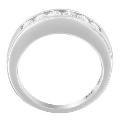 White metal ring with a channel setting of round white gemstones, viewed from above.