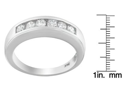 White metal ring with a curved top featuring round white gemstones in a channel setting, shown at a slight angle with a ruler for size reference.