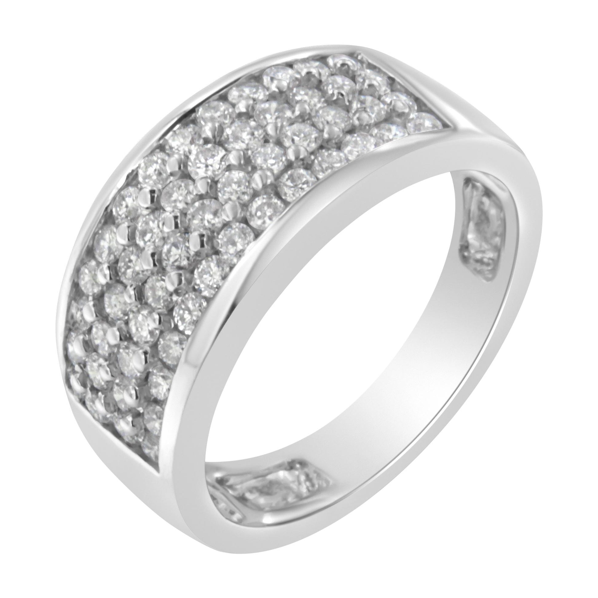 White metal ring with a wide band featuring multiple round white gemstones in a pave setting, shown at a slight angle.