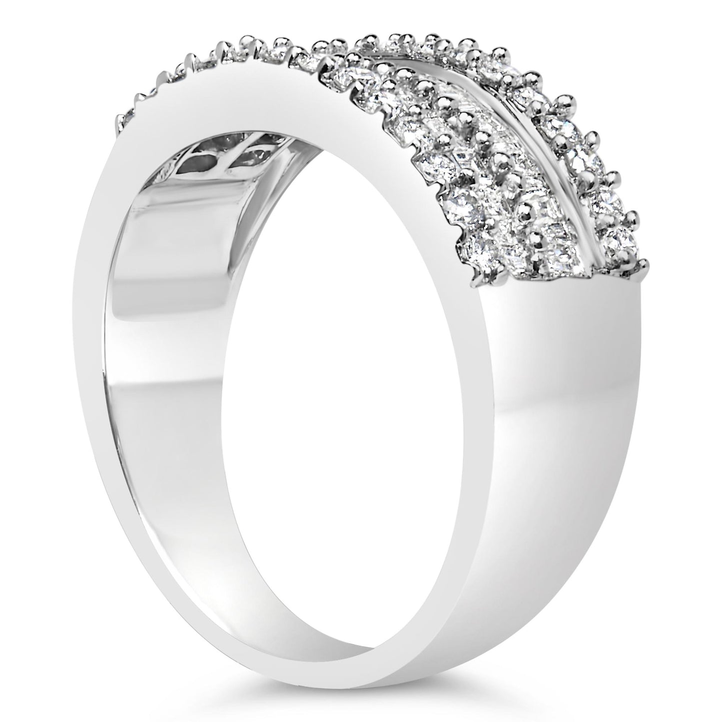 White metal ring with round prong-set white gemstones and baguette channel-set white gemstones, shown in a side angle view.