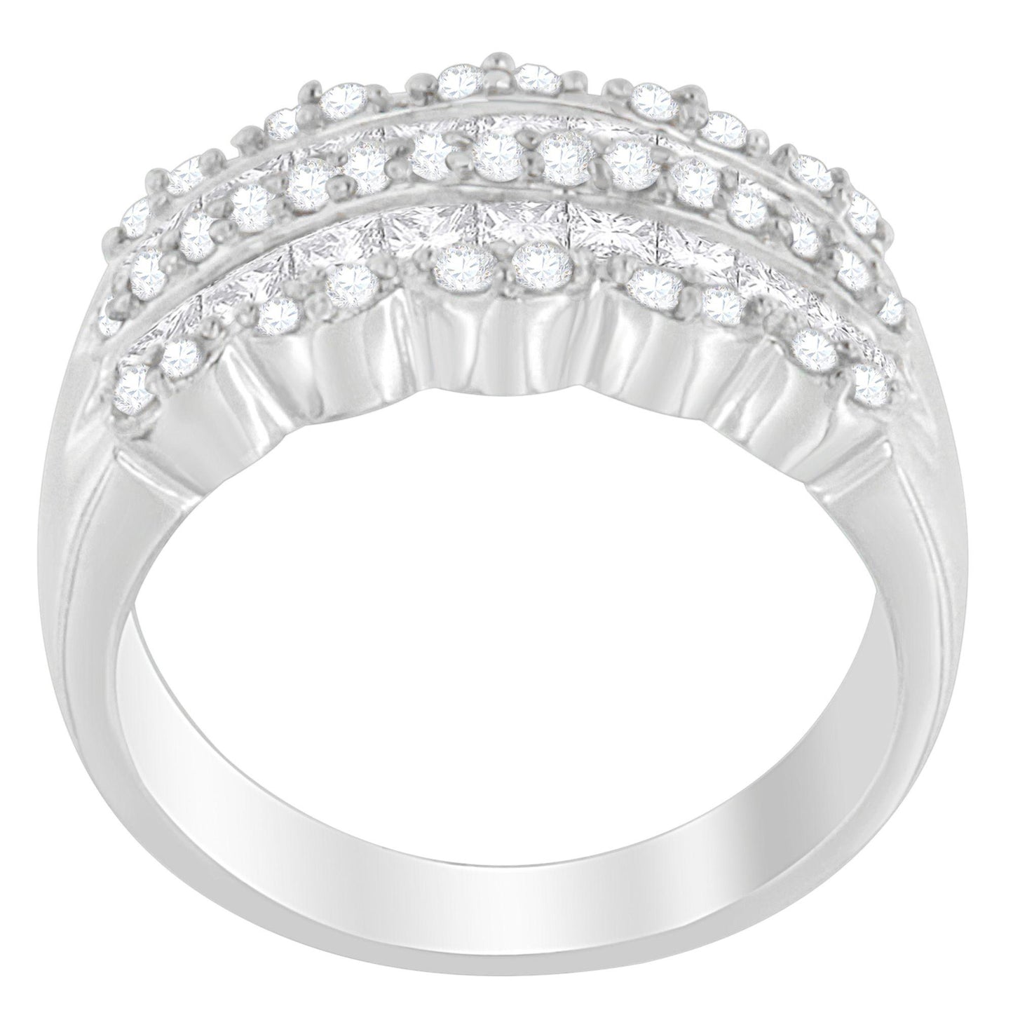 White metal ring with rows of round and princess-shaped white gemstones, side angled view.