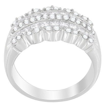 White metal ring with rows of round and princess-shaped white gemstones, side angled view.