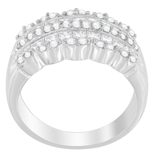 White metal ring with rows of round and princess-shaped white gemstones, side angled view.