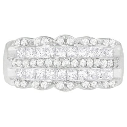 Top-down close-up of a white ring featuring rows of round white gemstones in pave settings and princess-shaped white gemstones in invisible settings.